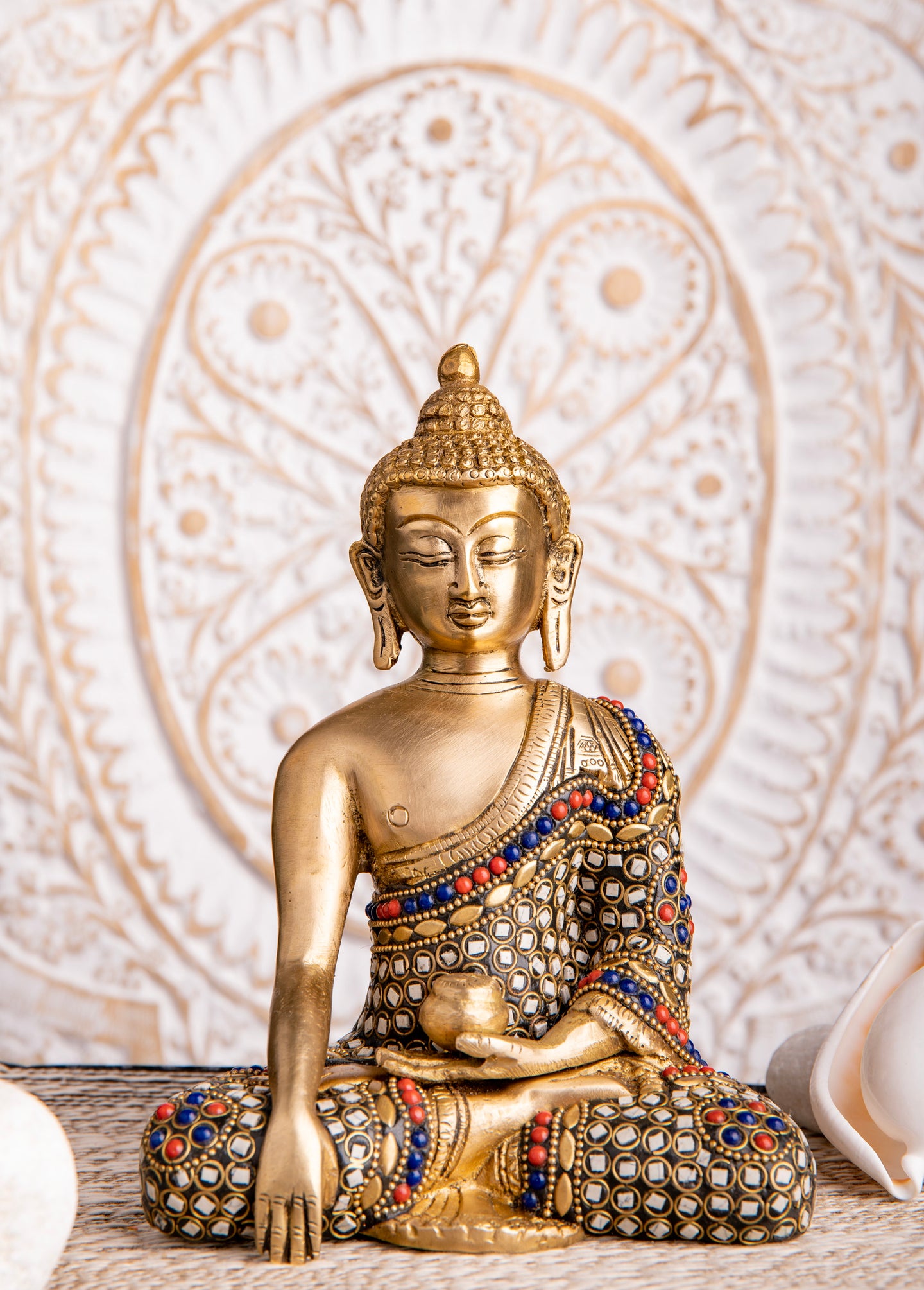 Shakyamuni Buddha messing with stone art